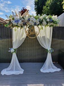 Oh Baby flower and curtain backdrop