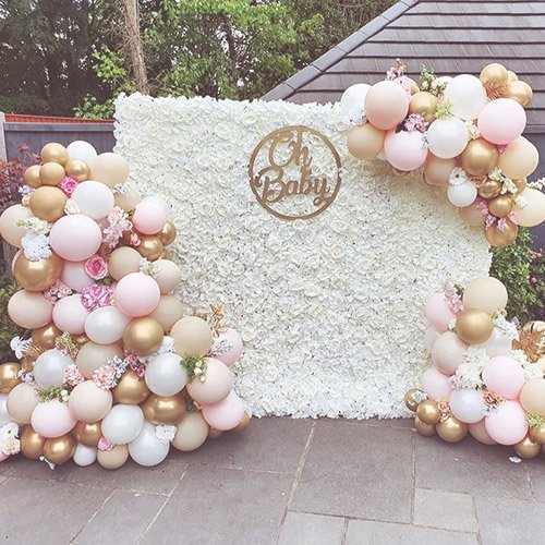 Baby shower backdrops, balloons and flowers