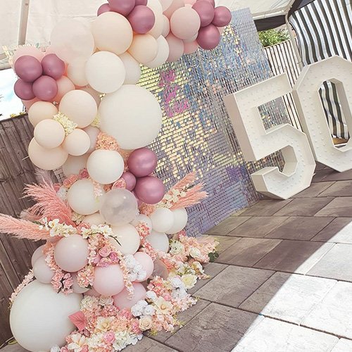 Birthday backdrops, balloons and prelim letters