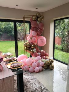 pink and red balloon display