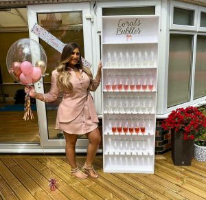 prosecco wall with balloons